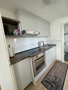 Η κουζίνα ή μικρή κουζίνα στο Stilvolle Wohnung im Stadtzentrum