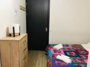 Postel nebo postele na pokoji v ubytování Borjomi inn