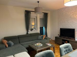 Posezení v ubytování Apartman Obala