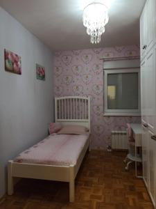 Postel nebo postele na pokoji v ubytování Apartman Obala