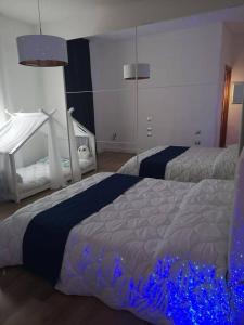 Postel nebo postele na pokoji v ubytování Island Suites Waterfront IUN R5783