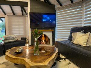 Posezení v ubytování Luxury Finca el Ensueño, casa entera, con Sauna, Jacuzzi, BBQ y Caballos