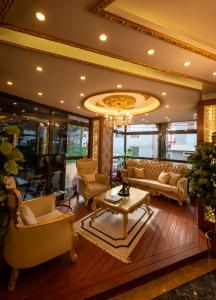 A seating area at Golden Dream Otel