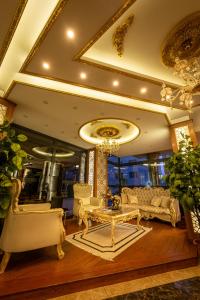 A seating area at Golden Dream Otel