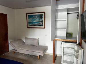 TV a/nebo společenská místnost v ubytování Cozy Cottage Posada Turistica
