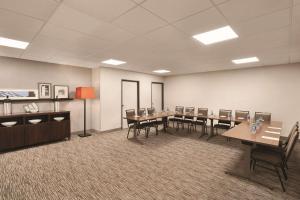 a conference room with tables and chairs in a room at Country Inn & Suites by Radisson, Savannah Midtown, GA in Savannah +45 photos