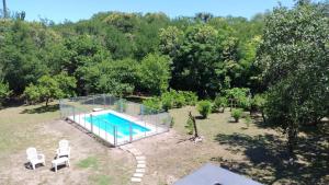 an overhead view of a house with a swimming pool at Las Toribias I in Merlo