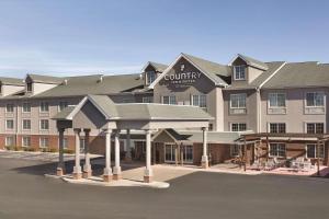 a rendering of a hotel with a building at Country Inn & Suites by Radisson, London, KY in London