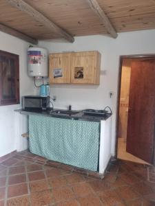 Kuchyň nebo kuchyňský kout v ubytování Departamento en la Villa