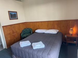 Postel nebo postele na pokoji v ubytování New Central Hotel Woodville