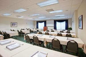 a conference room with tables and chairs in it at Country Inn & Suites by Radisson, Lancaster Amish Country , PA in Lancaster