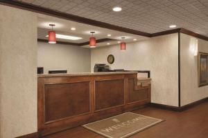 an office with a reception desk and a waiting room at Country Inn & Suites by Radisson, Portland, TX in Portland