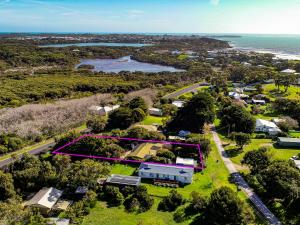an aerial view of a house with a yard at The Hideaway Long Beach - WIFI in Robe