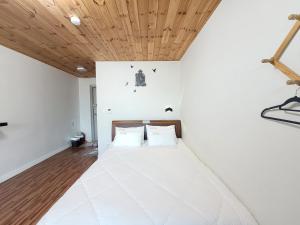 Postel nebo postele na pokoji v ubytování Starlight drops Pension