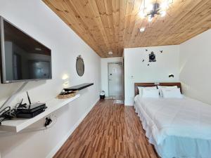 Postel nebo postele na pokoji v ubytování Starlight drops Pension