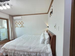 Postel nebo postele na pokoji v ubytování Starlight drops Pension