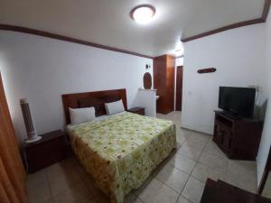 Postel nebo postele na pokoji v ubytování Hotel Estación Guadalajara