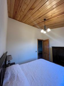 Postel nebo postele na pokoji v ubytování Casa Atitlan I