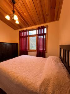 Postel nebo postele na pokoji v ubytování Casa Atitlan I