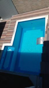 Πισίνα στο ή κοντά στο Casa temporada Arraial Dajuda