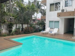 A piscina em ou perto de Rainforest Enclave, Arpora - 10 mins to Baga beach