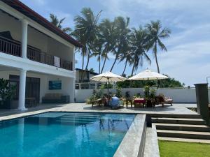 Poolen vid eller i närheten av Sea Star Boutique Hotel