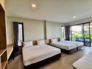 Uma área de estar em Rayong Chalet Hotel And Resort