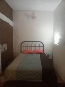 מיטה או מיטות בחדר ב-Casa 27