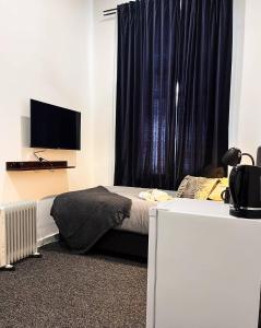 TV a/nebo společenská místnost v ubytování Manjimup Hotel