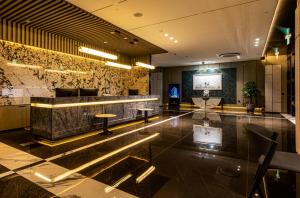 Lobbyn eller receptionsområdet på Jeju Bolton Hotel