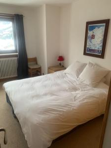 Postel nebo postele na pokoji v ubytování Le Portillo