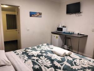 cliffinn kangaroo point客房内的一张或多张床位