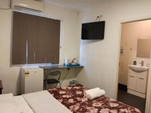 cliffinn kangaroo point客房内的一张或多张床位