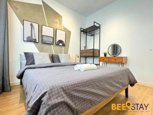 Postelja oz. postelje v sobi nastanitve Sensory Residence Dengkil by Beestay