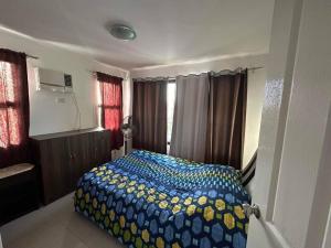 Llit o llits en una habitació de Mabalacat, Pampanga, Claremont Homes , MFR House