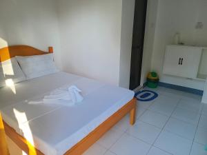 Postel nebo postele na pokoji v ubytování SAJUMSECO MPC INN