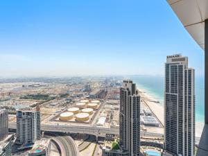 an aerial view of a city and the ocean at Contemporary Designed 1BDR - Address Beach JBR in Dubai