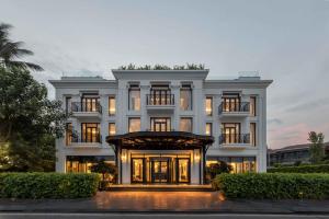 a large white building with a lot of windows at Elegant Mansion 88 in Hanoi