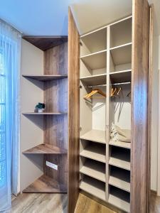 Postel nebo postele na pokoji v ubytování Apartmány nad Anenským potokem - Říčky