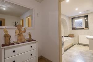 Un baño de Appartment Graukogel Blick 23 fotos más