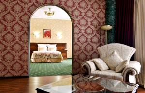 Кровать или кровати в номере Парк Отель Ставрополь