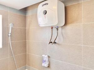 Ένα μπάνιο στο WH Bassac Residence +32 φωτογραφίες