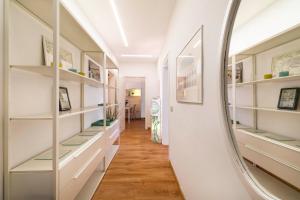 Televizors / izklaižu centrs naktsmītnē True Venice Apartment