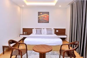 Ένα ή περισσότερα κρεβάτια σε δωμάτιο στο An Tín Hotel