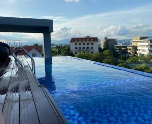 a swimming pool on the roof of a building at Indochine Ha Long Villa in Ha Long