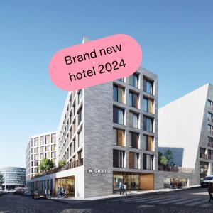 a rendering of a building with a sign that reads brand new hotel at Citybox Helsinki in Helsinki