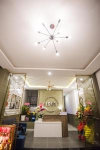 a flower shop with a ceiling fan and flowers at 1991 Boutique Hotel in Phan Thiet