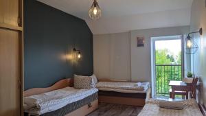Postel nebo postele na pokoji v ubytování Guest House Kamara