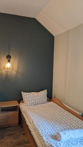 Postel nebo postele na pokoji v ubytování Guest House Kamara