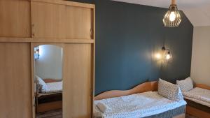 Postel nebo postele na pokoji v ubytování Guest House Kamara